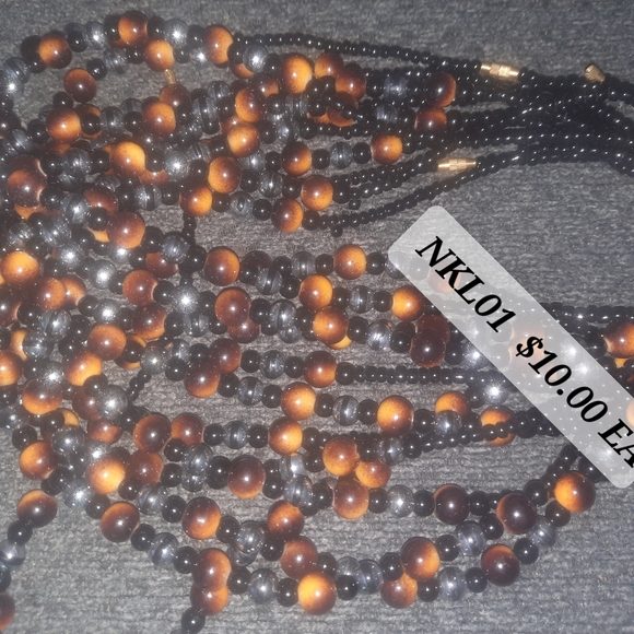 Ladies hand Bags and steak fans and ART,necklaces. Keys chains. - Picture 9 of 16